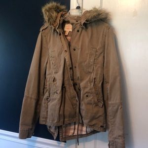 Levi tan jacket with fur hood